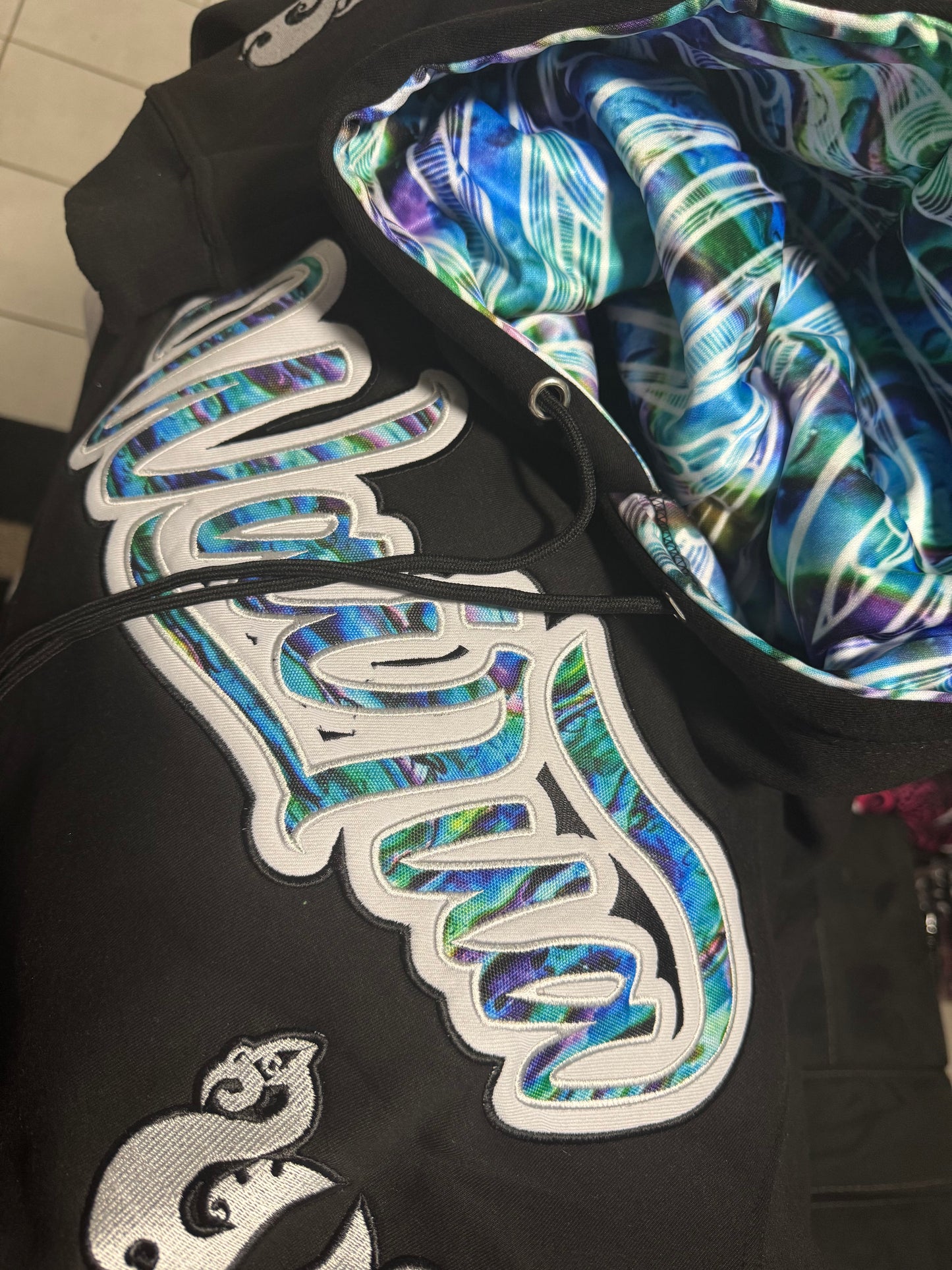 Black With Paua Design Hoody